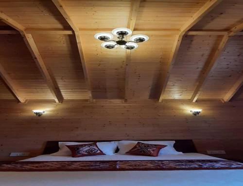 Postel nebo postele na pokoji v ubytování Vanprastha Resorts