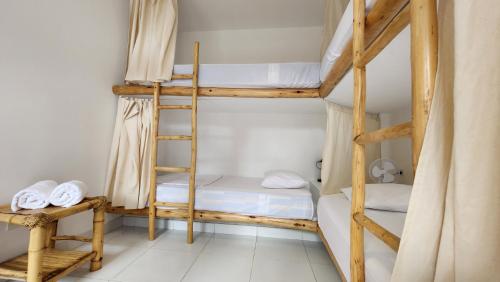 Postel nebo postele na pokoji v ubytování Kinti Guest House