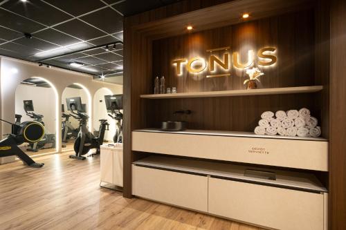 a gym with a sign that reads temus at Mercure Saint-Lary in Saint-Lary-Soulan