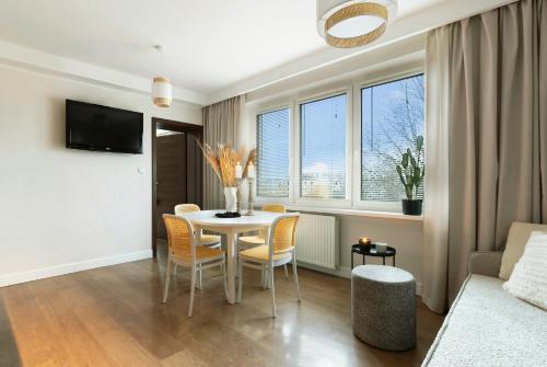 Телевизор и/или развлекательный центр в Elite Apartments Marine Brzeźno