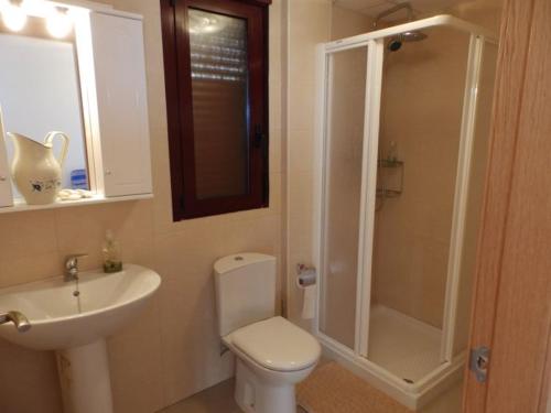 a bathroom with a toilet and a sink and a shower at MH38 - Apartment with wonderful sea views in Murcia