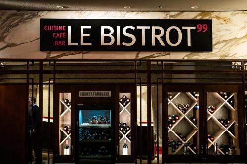 a store with a sign that readsene britoit at Dorint Hotel am Heumarkt Köln in Cologne