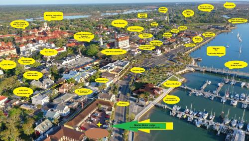 an aerial view of a harbor with yellow signs at Historic Waterfront Marion Motor Lodge in downtown St Augustine in Saint Augustine