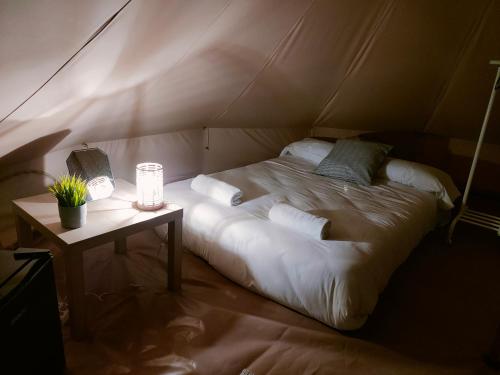 Ein Bett oder Betten in einem Zimmer der Unterkunft Glamping Atlántico