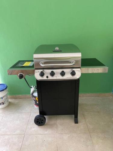 a stove sitting in a kitchen with a counter at Villa Don Manuel in Villa Altagracia