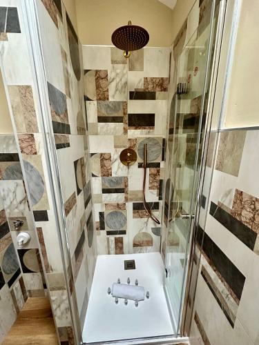a bathroom with a shower and a sink at Casa Valprato in Turin