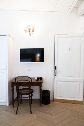 TV a/nebo společenská místnost v ubytování Domus Vitra