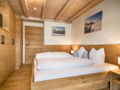 Ένα ή περισσότερα κρεβάτια σε δωμάτιο στο Bio-Kinderbauernhof Wilmershof