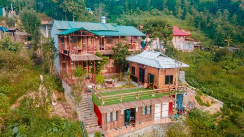 an overhead view of a house on a hill at Moc's House bắc hà in Bắc Hà