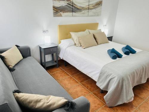 Postel nebo postele na pokoji v ubytování Casa Sonia