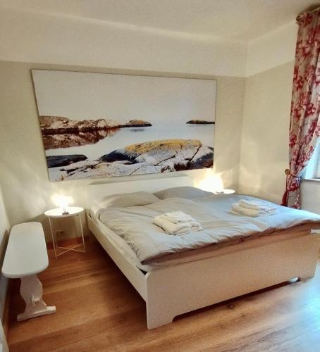 Katil atau katil-katil dalam bilik di "Haus Seegang" für Naturliebhaber, strandnah, ruhig, mit großem Garten