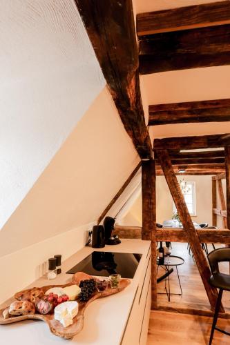 a kitchen with a stove top oven in a room at Gasthaus Faust in Knittlingen