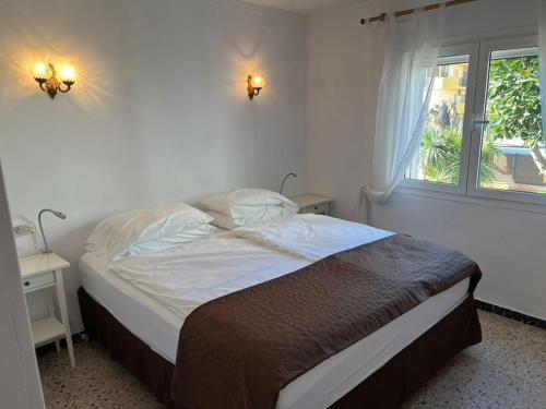 Ένα ή περισσότερα κρεβάτια σε δωμάτιο στο Schnuckelige Wohnung nähe Meer