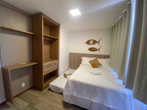 Katil atau katil-katil dalam bilik di Apartamento 110 Viva Barra
