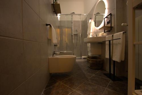 Kylpyhuone majoituspaikassa ARCApartaments