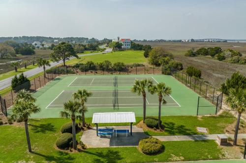 an aerial view of a tennis court with palm trees at Harbor Island F206 in Oceanmarsh Subdivision