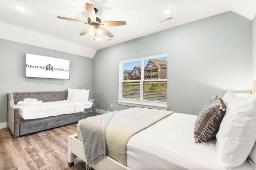 a bedroom with a bed and a couch at Near Indoor & Outdoor Pools: Hot Tub, Game Room & Free SDC Tickets in Kimberling City