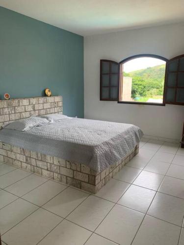 Postel nebo postele na pokoji v ubytování Casa para descanso - Avelar