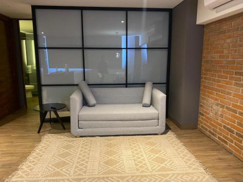 Posezení v ubytování Modernos departamentos tipo LOFT a dos calles del estadio