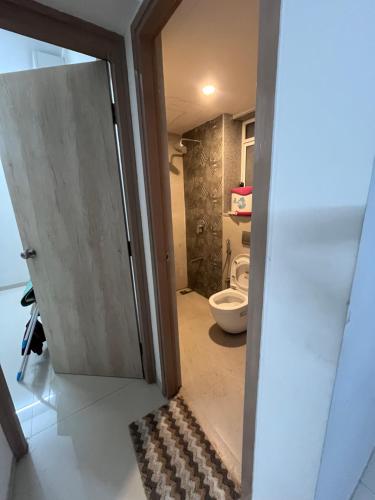 A bathroom at Lodha 1 bhk property Thane with parking