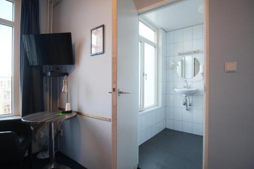 Koupelna v ubytování Hotel Abba