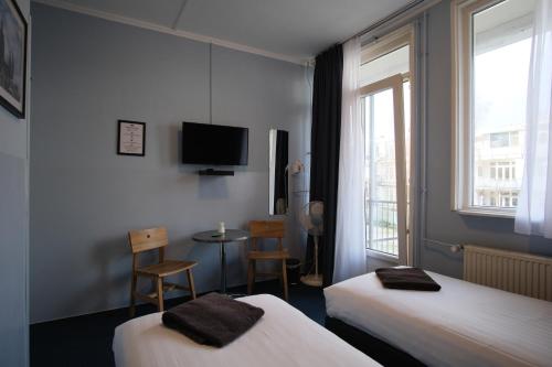 Кровать или кровати в номере Hotel Abba