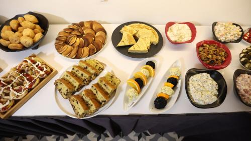 a display of different types of food on a table at Royal Tophane in Istanbul