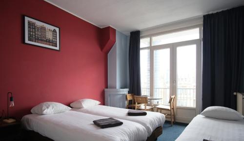 Кровать или кровати в номере Hotel Abba