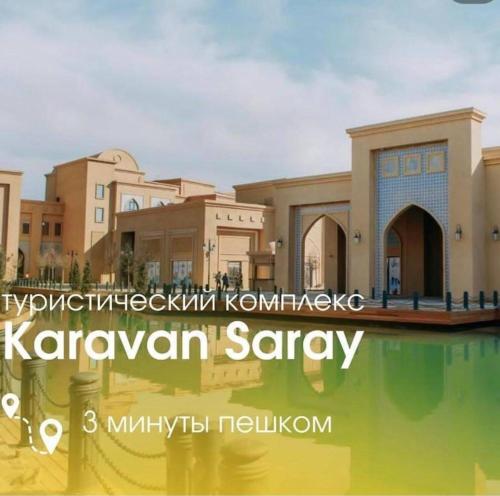 een foto van een moskee met de woorden karavanavanavanavan saari bij Keruen Saray Apartments 2 in Türkistan