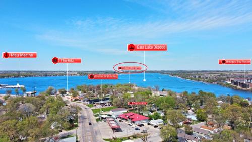 an overhead view of a city with street signs and a river at The Lakeside Lookout on Gingles Point in Arnolds Park