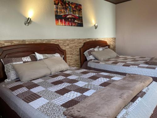 Cama o camas de una habitación en Hotel Almore