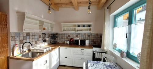 Dapur atau dapur kecil di Odú Vendégház