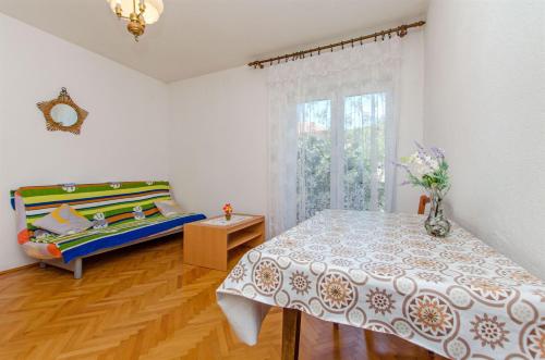 Postel nebo postele na pokoji v ubytování Apartments Bozjidar