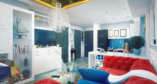 a living room with a red couch and a kitchen at Casa Mia - Modern Luxury Apartament in Bucharest