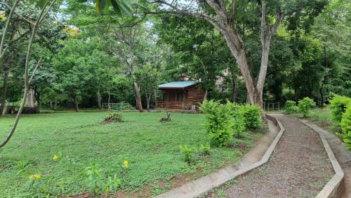 Сад в Hotel Hacienda Angeles