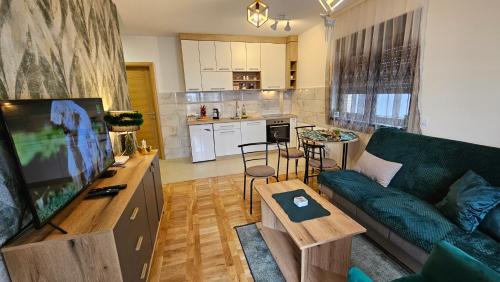 Η κουζίνα ή μικρή κουζίνα στο Apartman 01