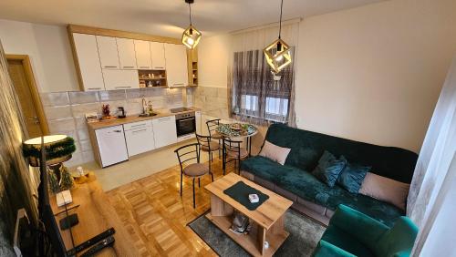 Η κουζίνα ή μικρή κουζίνα στο Apartman 01