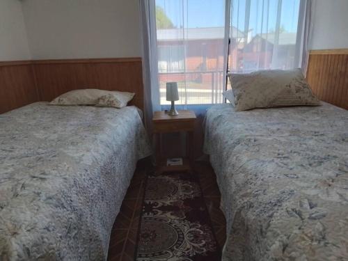 Postel nebo postele na pokoji v ubytování Departamento Interior 1 Villarrica Céntrico