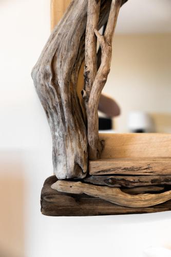 a piece of driftwood sitting on top of a table at The Ferns-Ideal base for exploring the Causeway Coast in Armoy