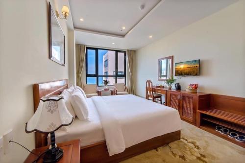 Кровать или кровати в номере Phuoc My An Beach