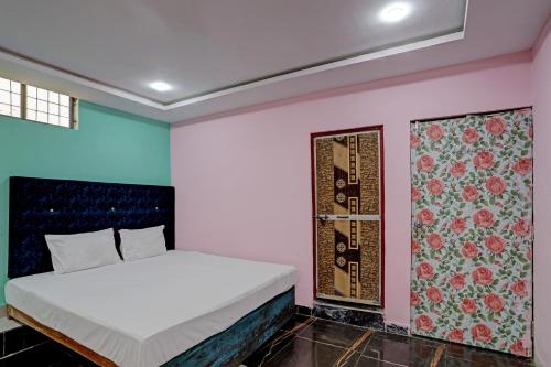 Un ou plusieurs lits dans un hébergement de l'établissement OYO Hotel Gupta