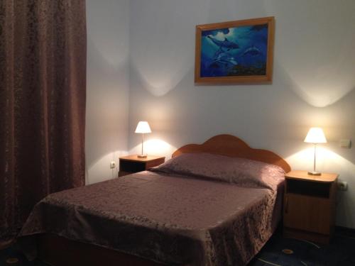 Cama ou camas em um quarto em Guest House Taiver
