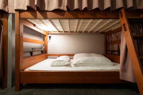 IMANO TOKYO HOSTELにあるベッド