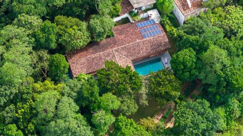 an aerial view of a house in the forest at Minnehaha Bentota in Bentota
