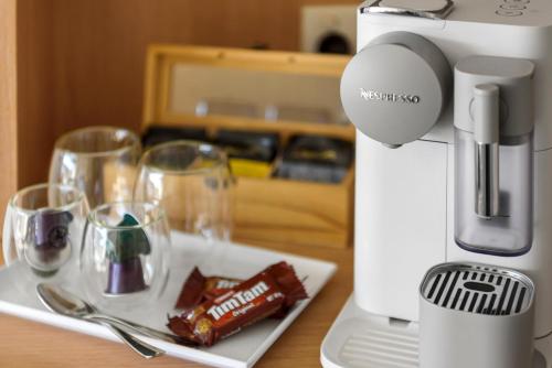 a food processor with a plate of food on a table at Springs Shoalhaven Nowra in Nowra