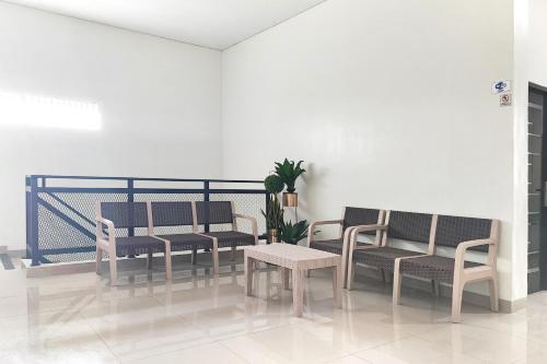 Гостиная зона в Urbanview Hotel Syariah near Polda Jambi