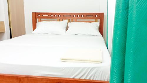Łóżko lub łóżka w pokoju w obiekcie Seaside Heights 2BR 43' Smart TV