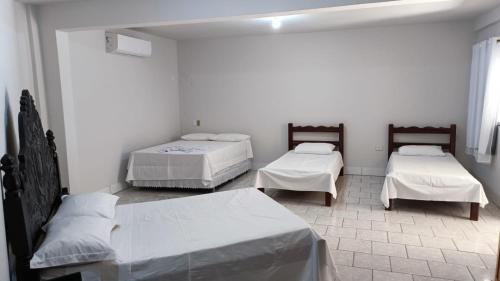 Ein Bett oder Betten in einem Zimmer der Unterkunft Hotel Turazzi