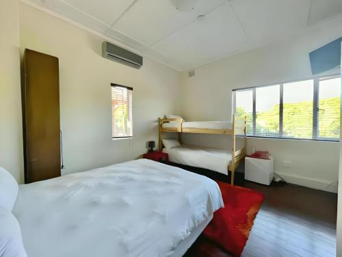Ένα ή περισσότερα κρεβάτια σε δωμάτιο στο Kzn Park View Guest House