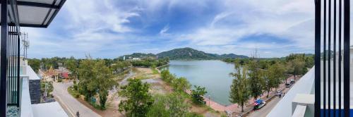 a view of a lake from a building at Turtle Nest in Khao Tao